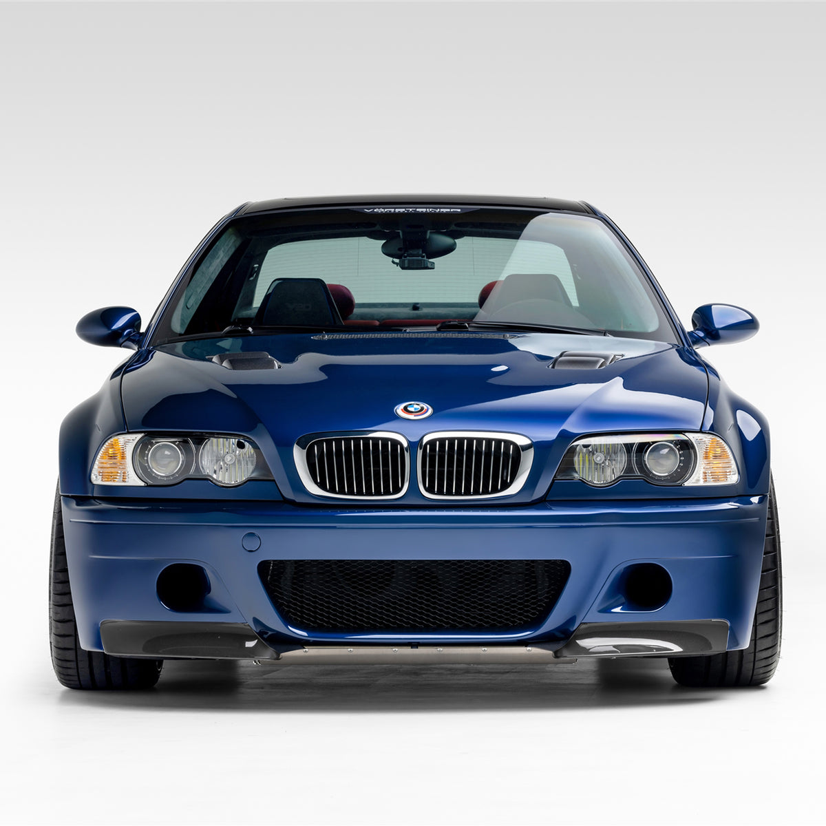 BMW E46 M3 V20 Aero carbon fiber front bumper with 2-piece splitter, glossy finish, designed for BMW E46 M3 models.