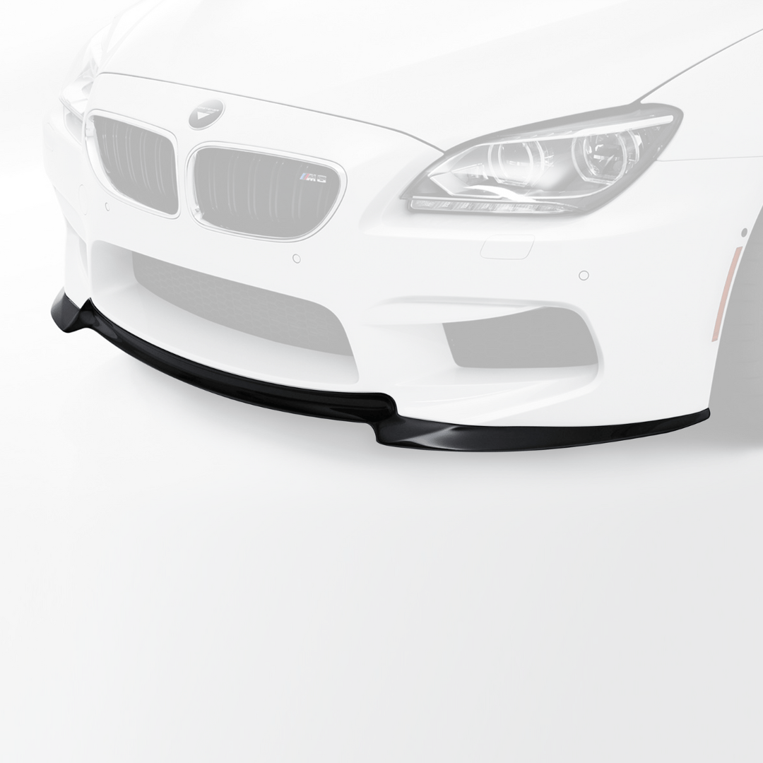 BMW F12 M6 V-Style Aero front spoiler in carbon fiber by Vorsteiner Aerodynamics, showcasing sleek, aerodynamic design.