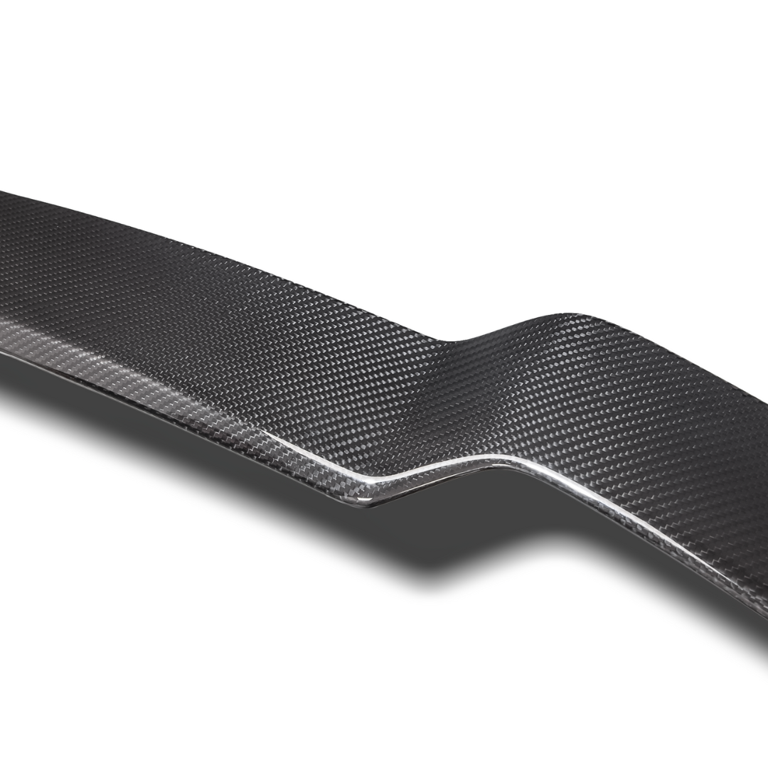 BMW G8X M3 carbon fiber decklid spoiler by Vorsteiner, V-Style aero spoiler enhancing car's sporty look and aerodynamics.