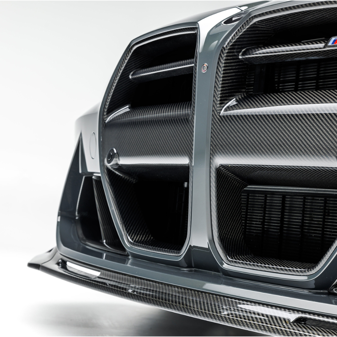 BMW G8X M3 M4 Vorsteiner carbon fiber front spoiler V-Style aero aerodynamic upgrade, lightweight and performance-enhancing.