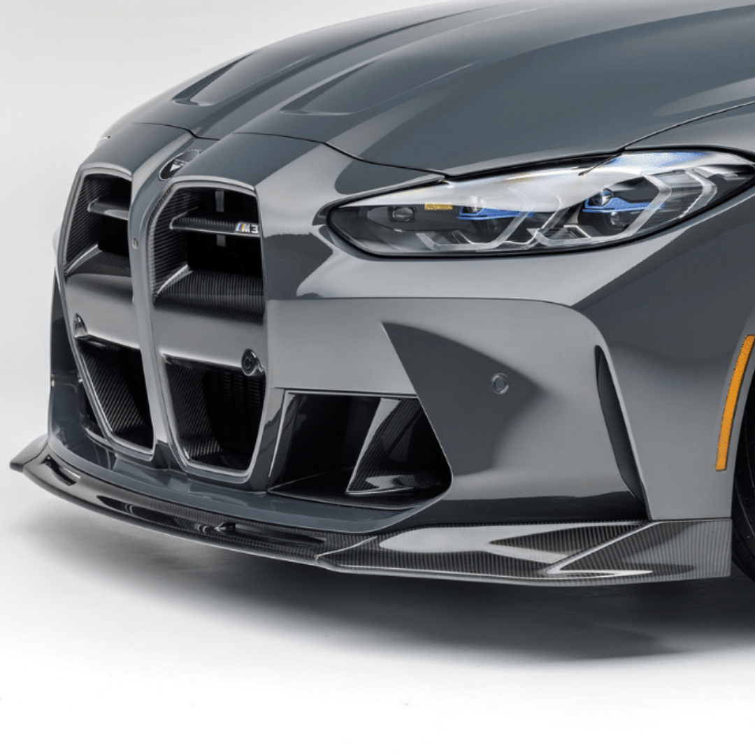 BMW G8X M3 M4 Vorsteiner Aero carbon fiber front spoiler V-Style for enhanced aerodynamics and sporty appearance.