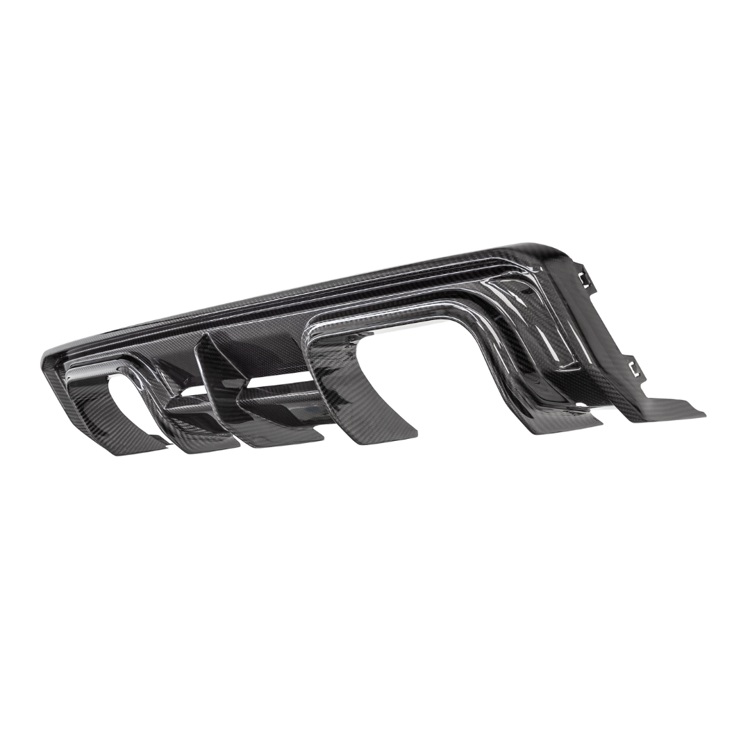 BMW G8X M4 carbon fiber rear diffuser by Vorsteiner Aero, V-Style™️ design, showcasing aerodynamic, high-performance vehicle enhancement.