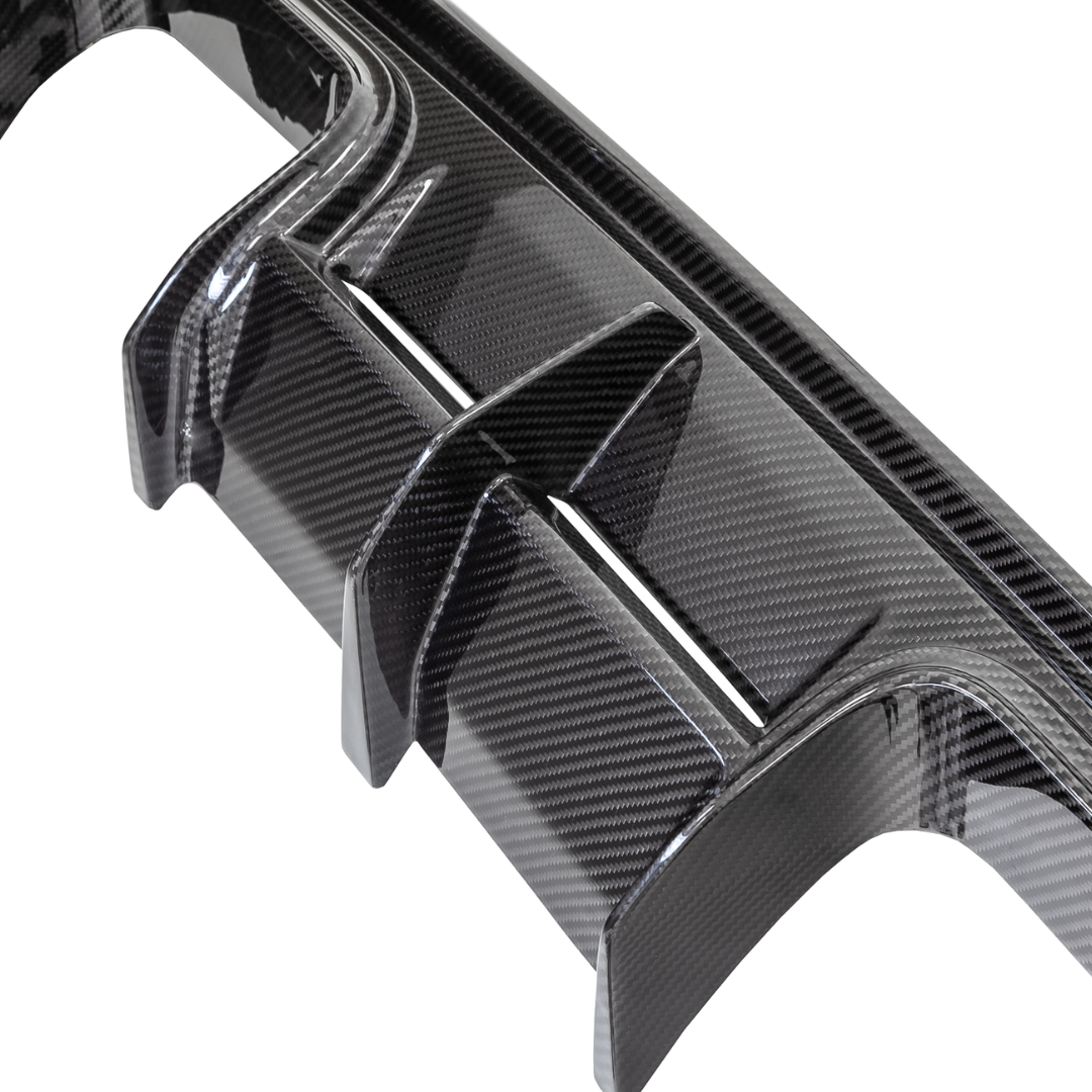 BMW G8X M4 carbon fiber rear diffuser by Vorsteiner Aero, showcasing a sleek V-Style™️ design for enhanced aerodynamics.