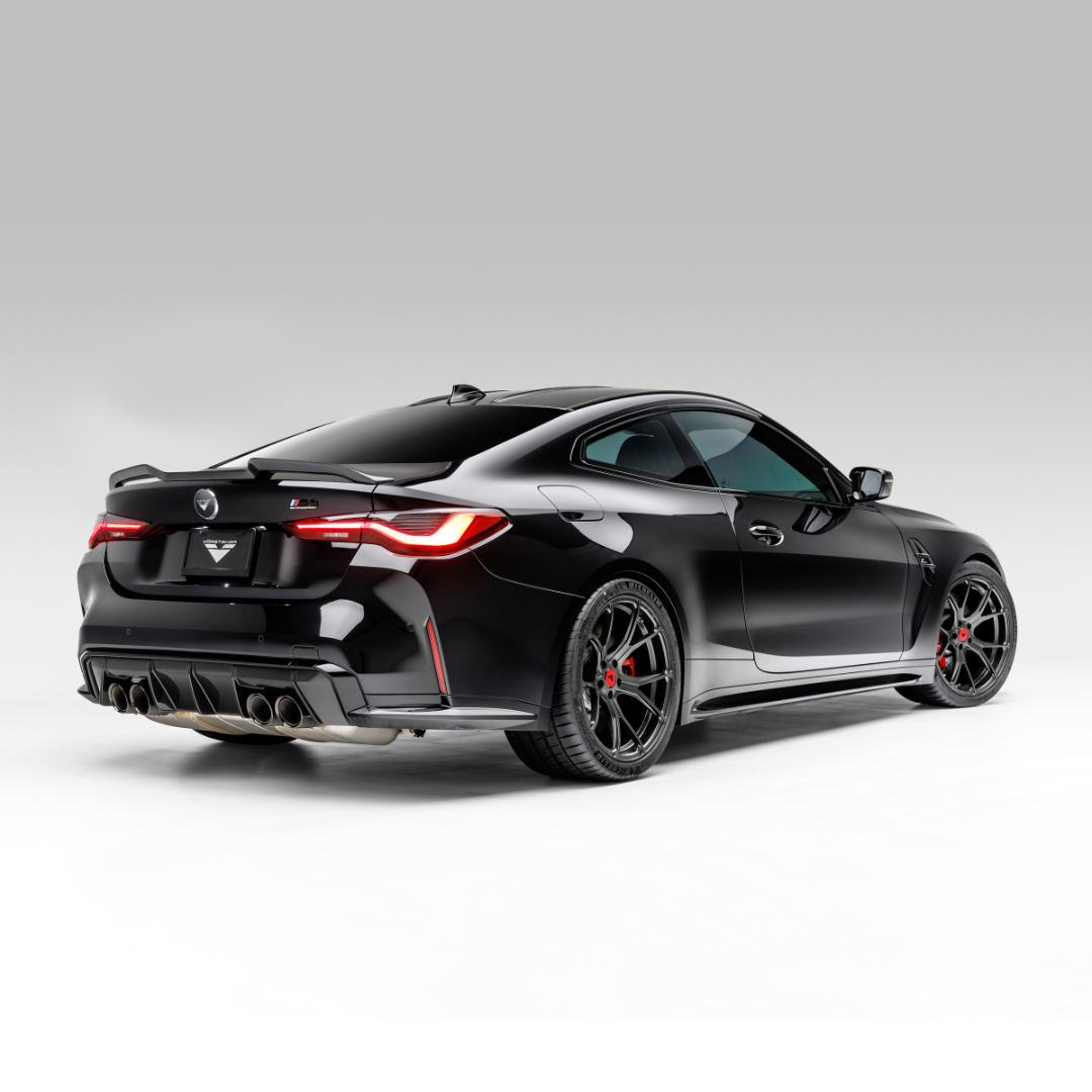 BMW G82 M4 carbon fiber aero decklid spoiler by Vorsteiner Aerodynamics, V-Style™️, shown on the car's rear decklid.