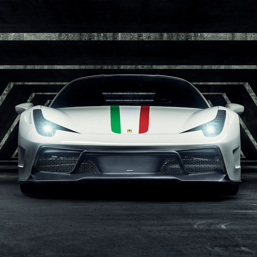 Vorsteiner Aerodynamics Ferrari 458 Italia VX carbon fiber front bumper with integrated front spoiler, showcasing sleek aerodynamic design.