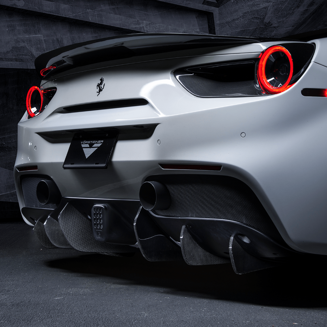 Set of six Ferrari 488 Diavolo carbon fiber rear diffuser fins for aerodynamic enhancement by Vorsteiner Aerodynamics.
