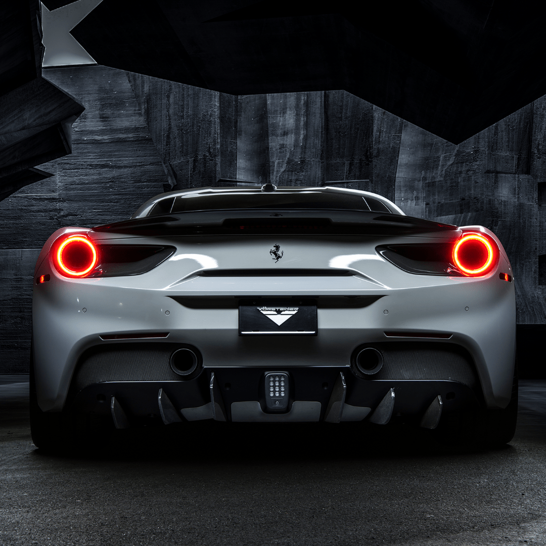 Set of six Ferrari 488 Diavolo carbon fiber rear diffuser fins by Vorsteiner Aerodynamics for enhanced aero performance.