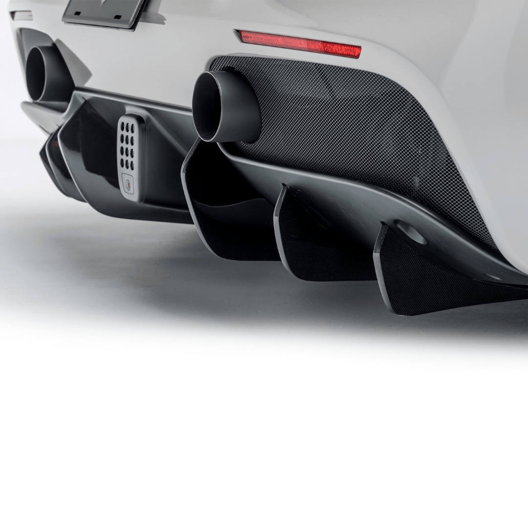 Set of six Vorsteiner Ferrari 488 Diavolo carbon fiber rear diffuser fins for enhanced aerodynamics and sporty appearance.