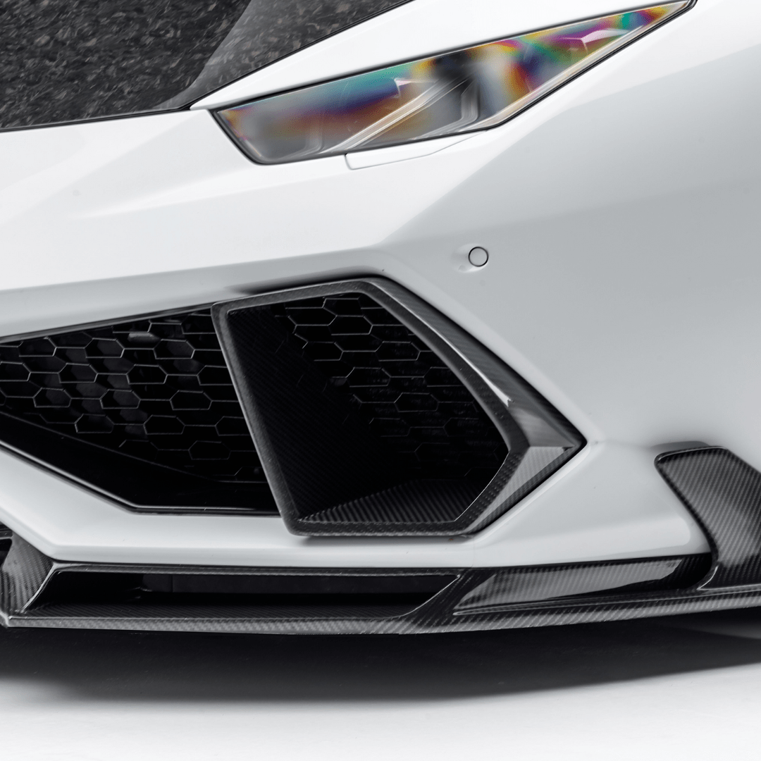 Lamborghini Huracan Mondiale Aero air intake bezels in carbon fiber by Vorsteiner Aerodynamics, showcasing detailed aerodynamic design.