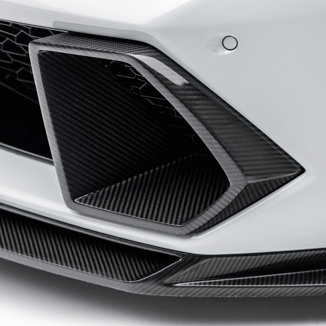 Vorsteiner Aerodynamics Lamborghini Huracan Mondiale carbon fiber aero air intake bezels, enhancing sporty look and airflow.