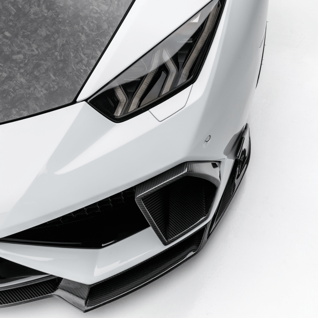 Vorsteiner Aero carbon fiber air intake bezels on a Lamborghini Huracan Mondiale for aerodynamic enhancement.