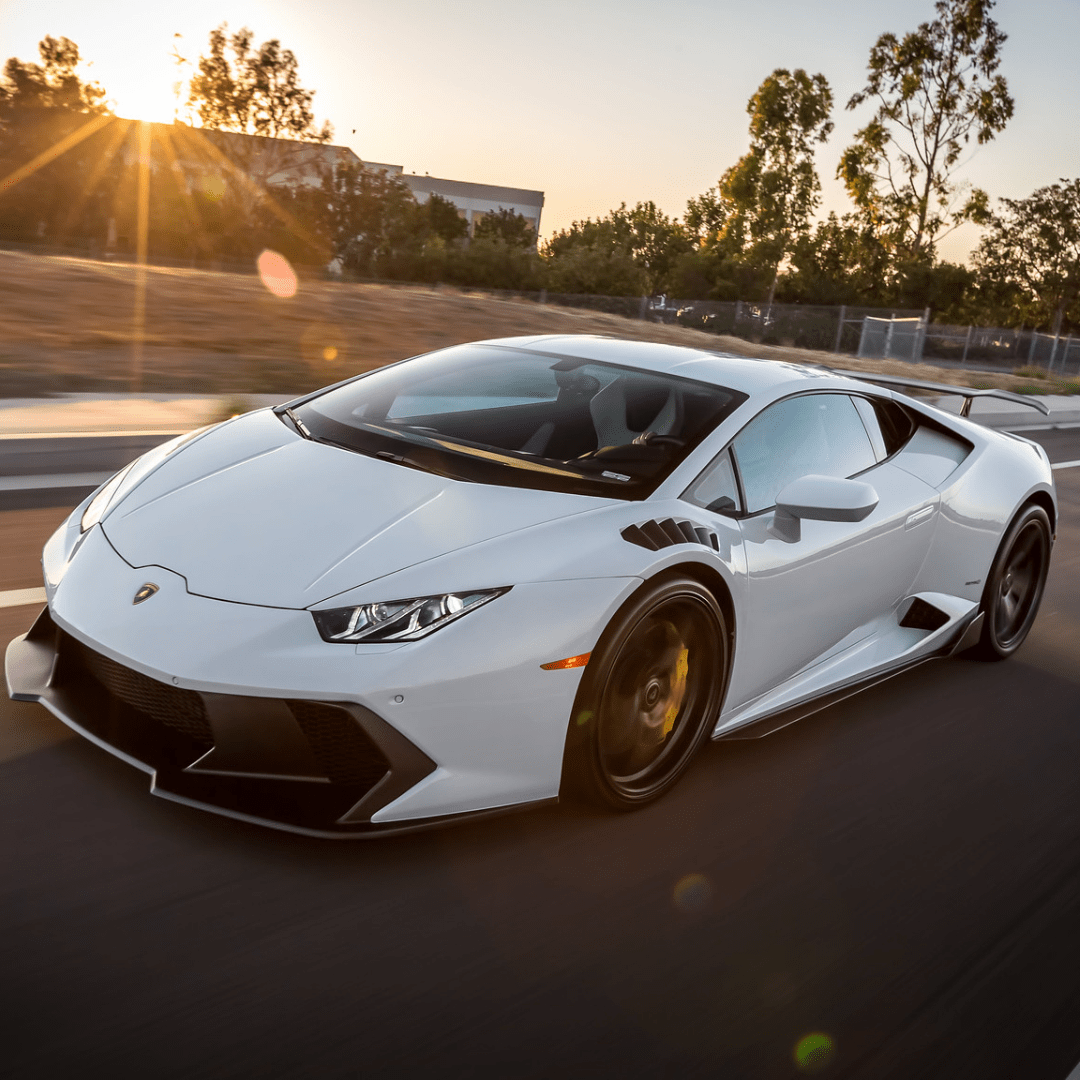 Lamborghini Huracan Novara Aero front fenders with integrated vents and splash shields in gloss carbon fiber by Vorsteiner Aerodynamics.
