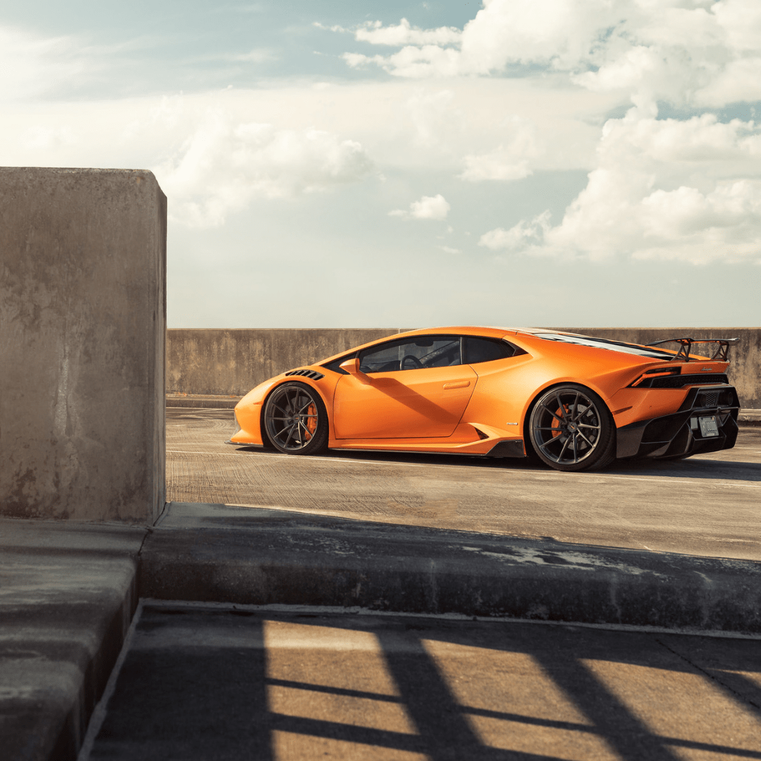 Vorsteiner Aerodynamics Lamborghini Huracan Novara Aero front fenders with integrated vents and splash shields in gloss carbon fiber.