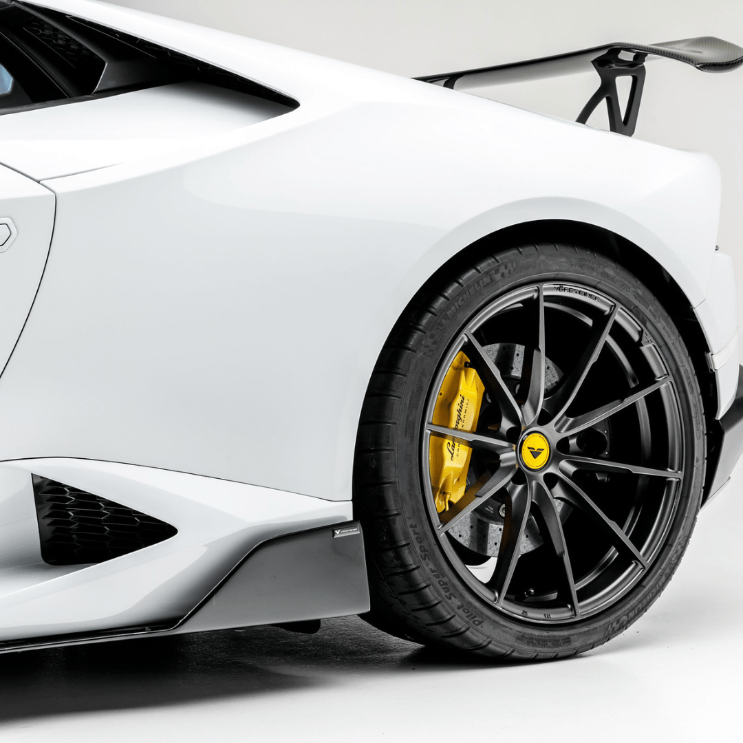 Vorsteiner aerodynamic carbon fiber side blades for Lamborghini Huracan Novara Edizione Aero, enhancing front bumper and side profile.