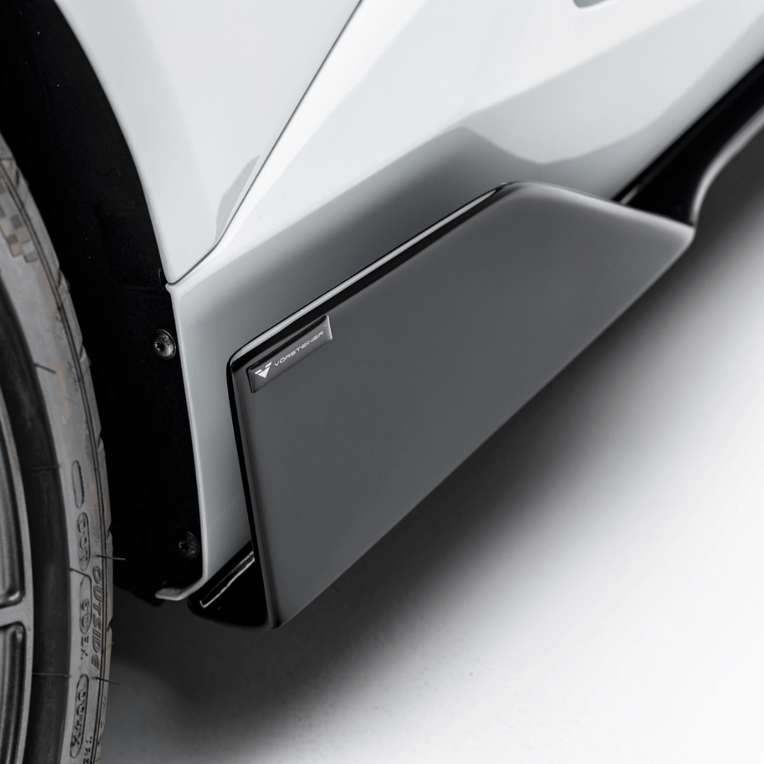 Vorsteiner Aerodynamics Lamborghini Huracan Novara Edizione Aero side blades in carbon fiber with sleek, aerodynamic design.