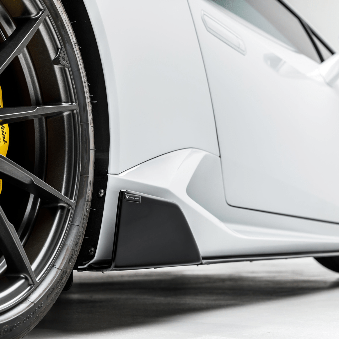 Vorsteiner Aerodynamics Lamborghini Huracan Novara Edizione Aero side blades in carbon fiber for enhanced sporty appearance.