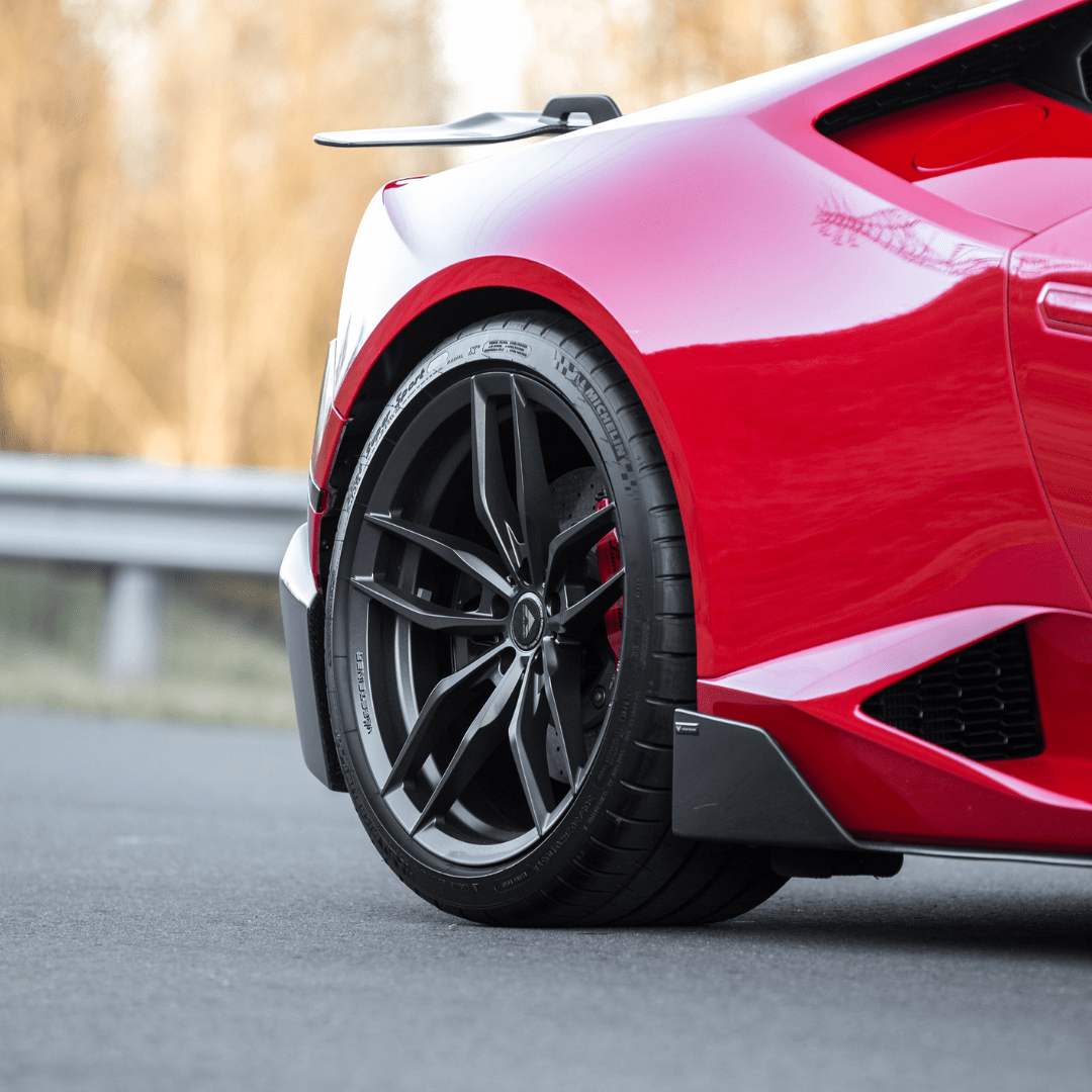 Lamborghini Huracan Verona Edizione Aero side blades in carbon fiber by Vorsteiner Aerodynamics, showcasing sleek design and aerodynamic detail.
