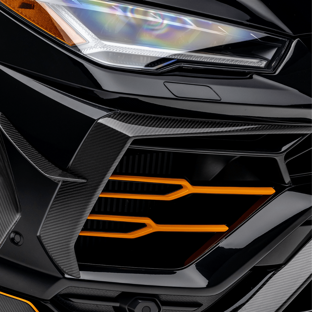 Vorsteiner Aerodynamics Lamborghini Urus Rampante Aero front airducts in carbon fiber, enhancing vehicle's airflow and sporty appearance.