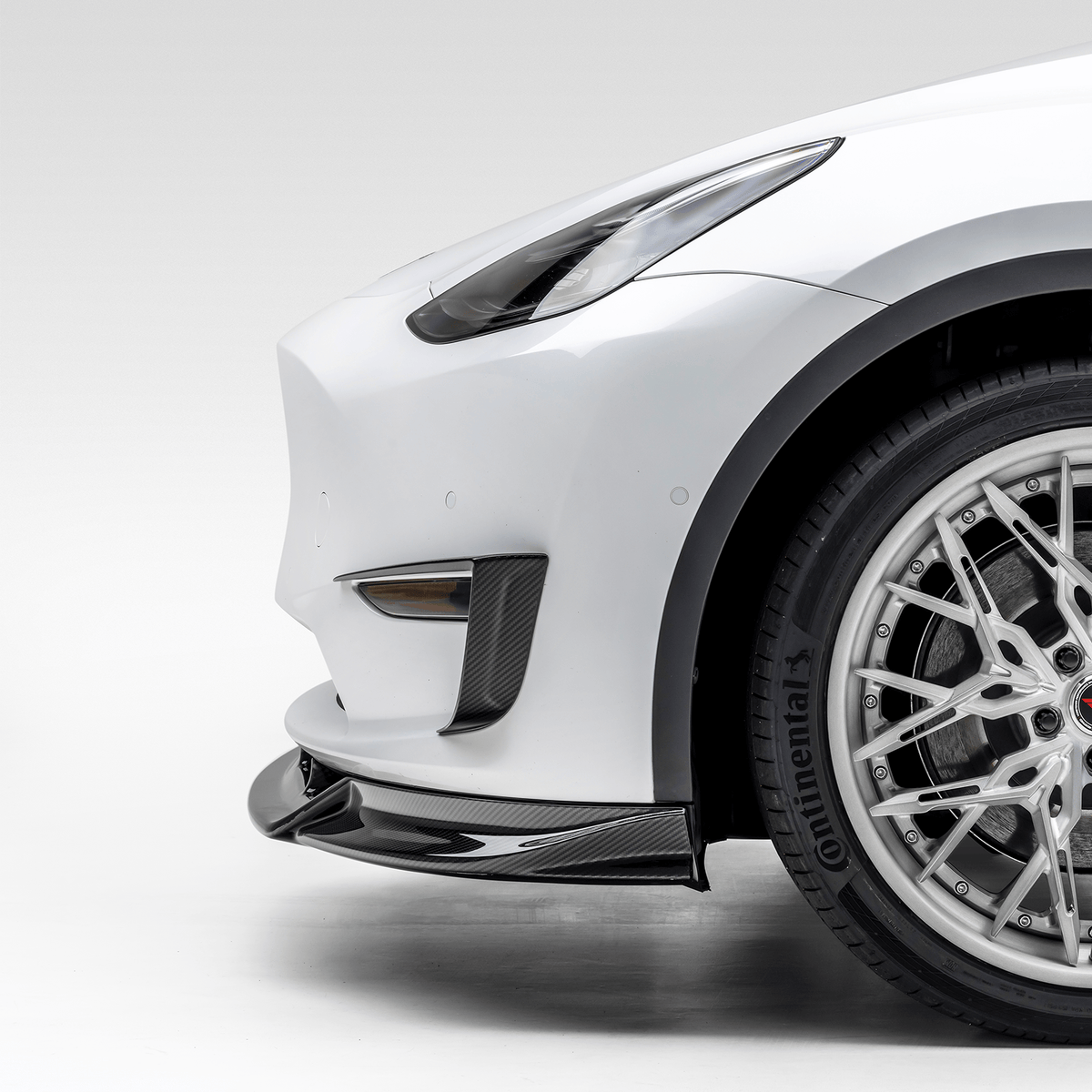 Tesla Model Y Aero Add-On Bumper Flares by Vorsteiner Aerodynamics, featuring sleek design and enhanced aerodynamics.