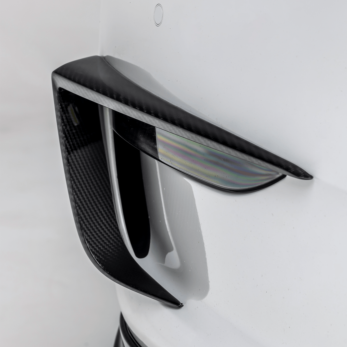 Vorsteiner Aerodynamics Tesla Model Y Aero bumper flares installed, enhancing the vehicle's sporty look and aerodynamics.