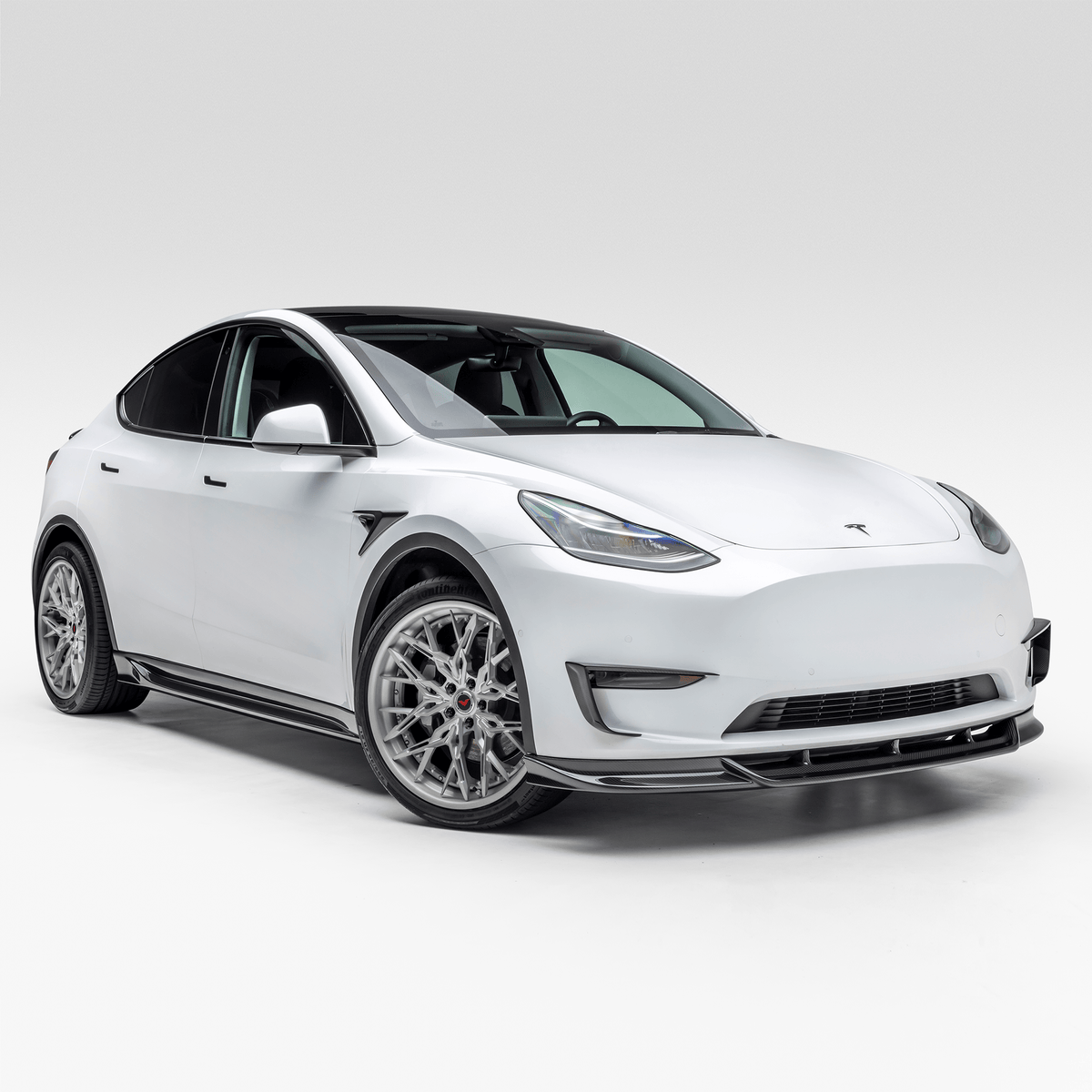Vorsteiner Aerodynamics Tesla Model Y Aero add-on fender vents showing sleek, aerodynamic vent designs on the vehicle's front fenders.