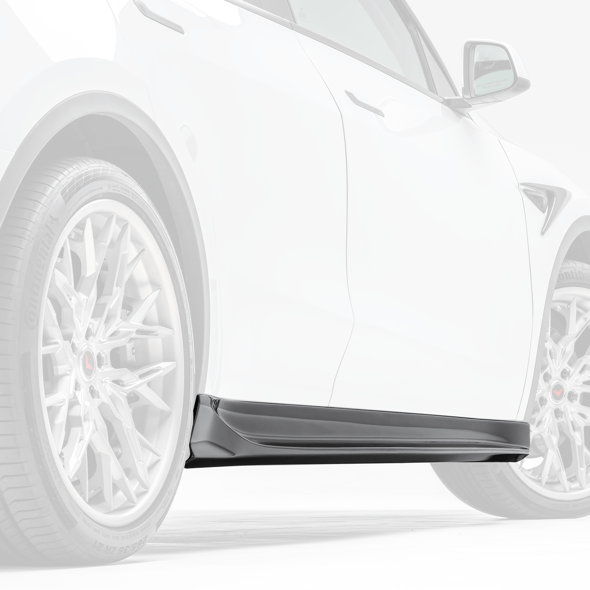 Vorsteiner Aero side skirts installed on a Tesla Model Y, showcasing sleek, aerodynamic design and high-quality automotive styling.