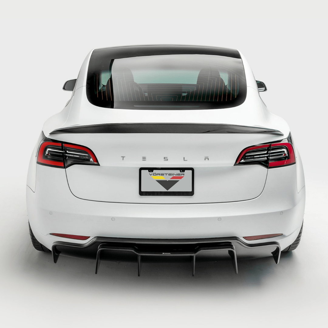 Tesla Model 3 Vorsteiner Aero Volta Carbon-Fiber Decklid Spoiler enhancing sporty aerodynamic look.