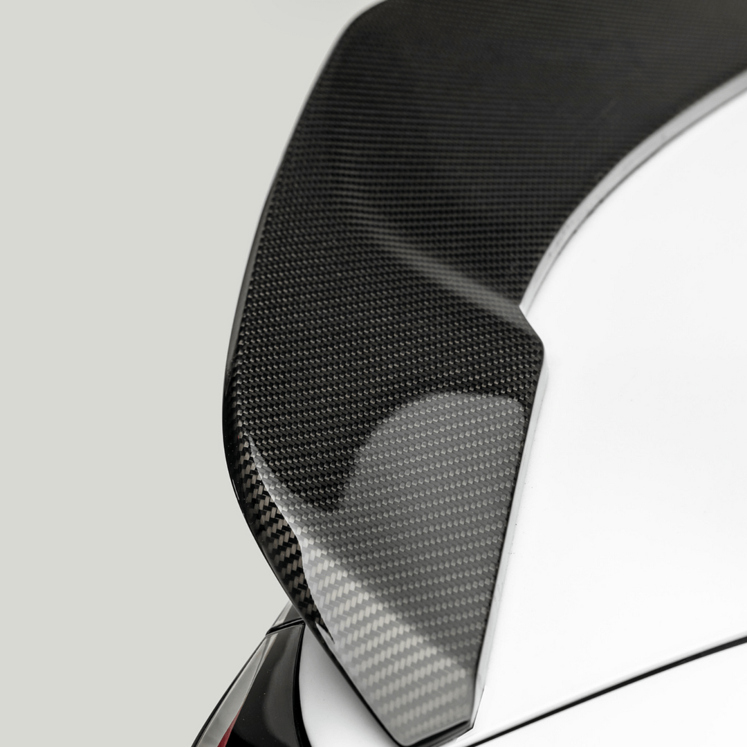Tesla Model 3 Volta Aero Decklid Spoiler by Vorsteiner Aerodynamics, featuring carbon fiber finish and sleek aerodynamic design.