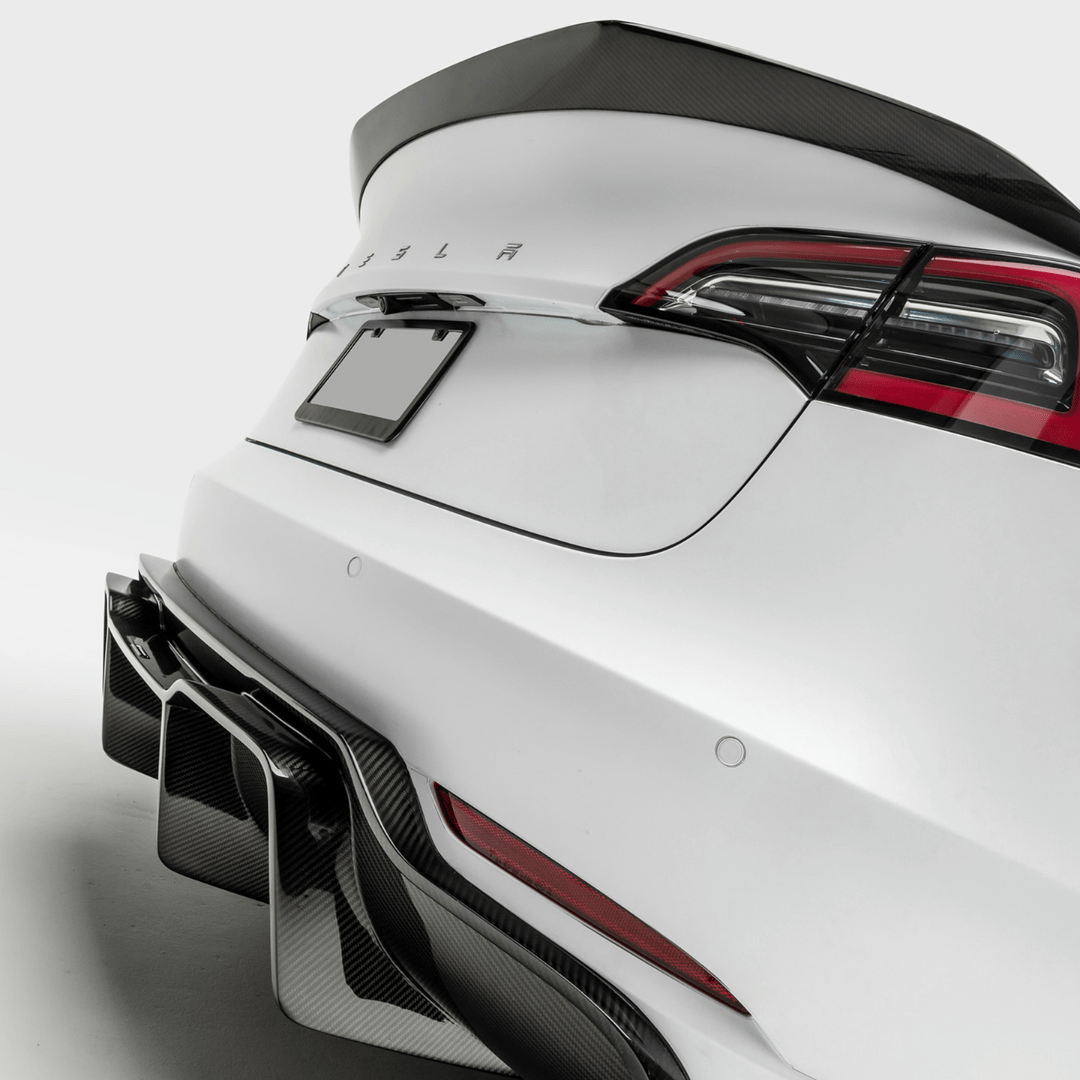 Tesla Model 3 Volta Aero Decklid Spoiler by Vorsteiner Aerodynamics, featuring carbon fiber construction and sleek aerodynamic design.