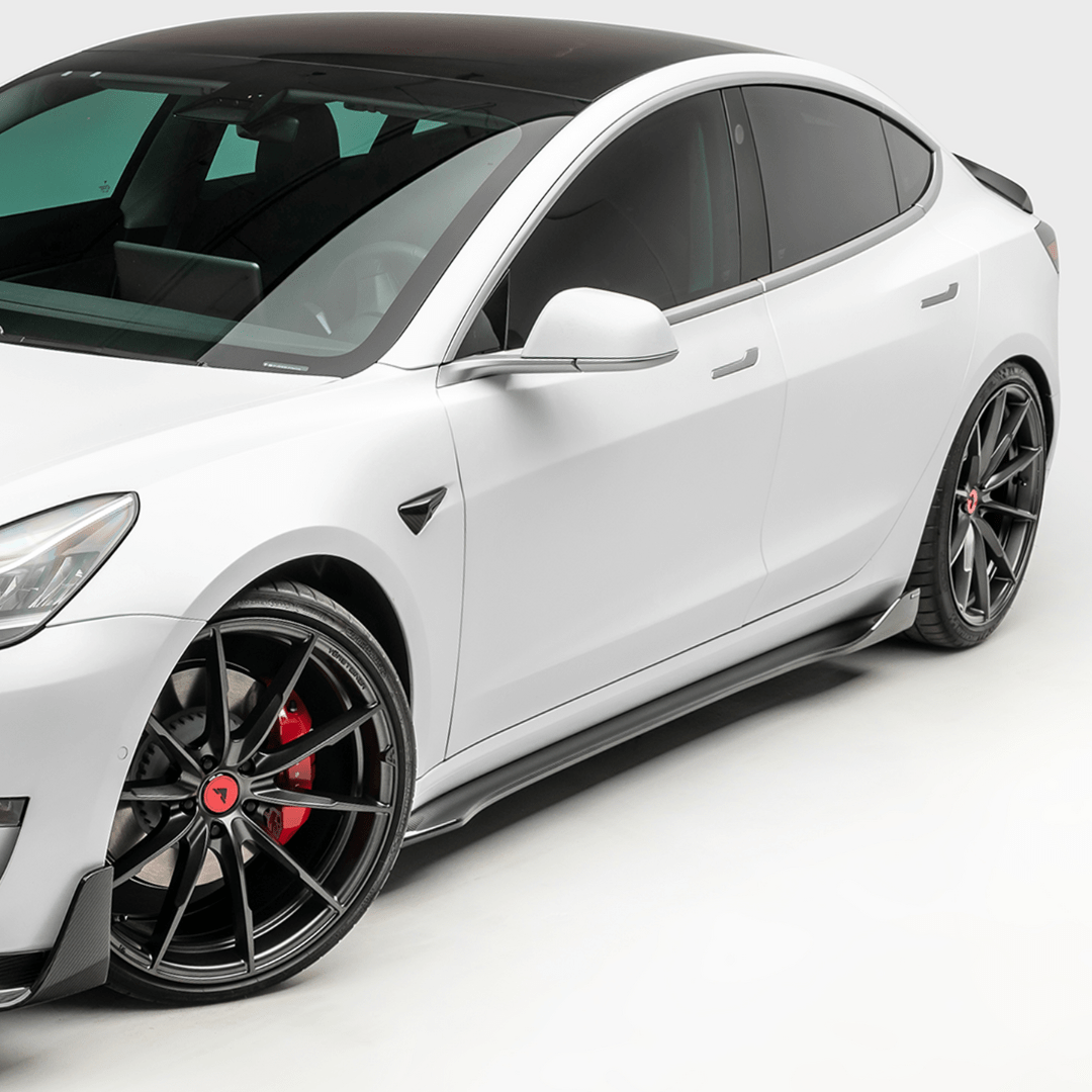 Vorsteiner Aerodynamics Tesla Model 3 Volta Aero side skirt in carbon fiber, showcasing sleek, aerodynamic design.