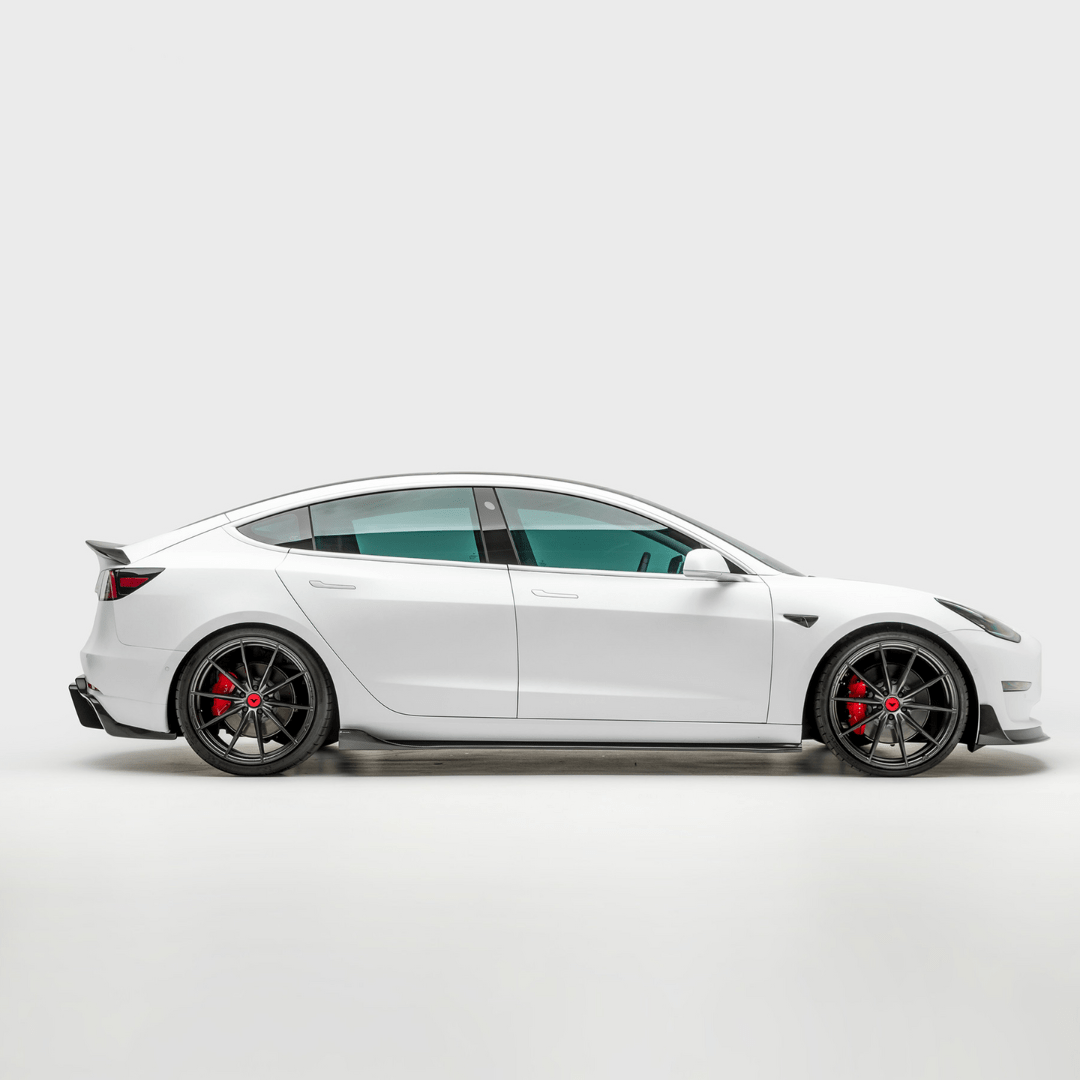 Carbon fiber Tesla Model 3 Volta Aero side skirt by Vorsteiner Aerodynamics, designed for enhanced aerodynamics and sporty look.