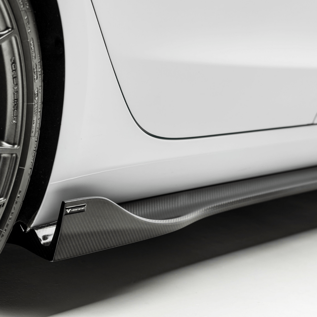 Vorsteiner Aerodynamics Tesla Model 3 Volta Aero side skirt in carbon fiber, showcasing sleek, aerodynamic design.
