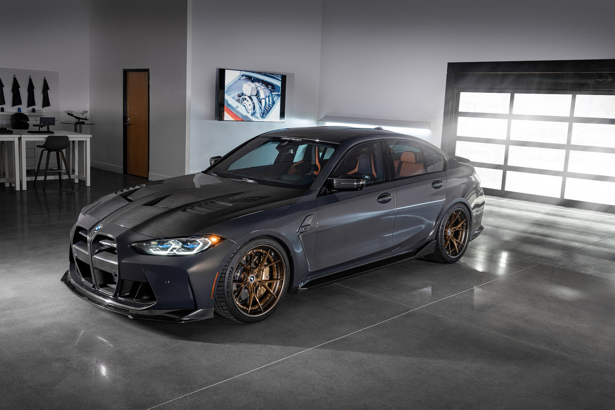 Vorsteiner GTS-V BMW G8X M3 M4 carbon fiber aero bonnet with V-Style design, highlighting the sleek, lightweight hood's detailed craftsmanship.