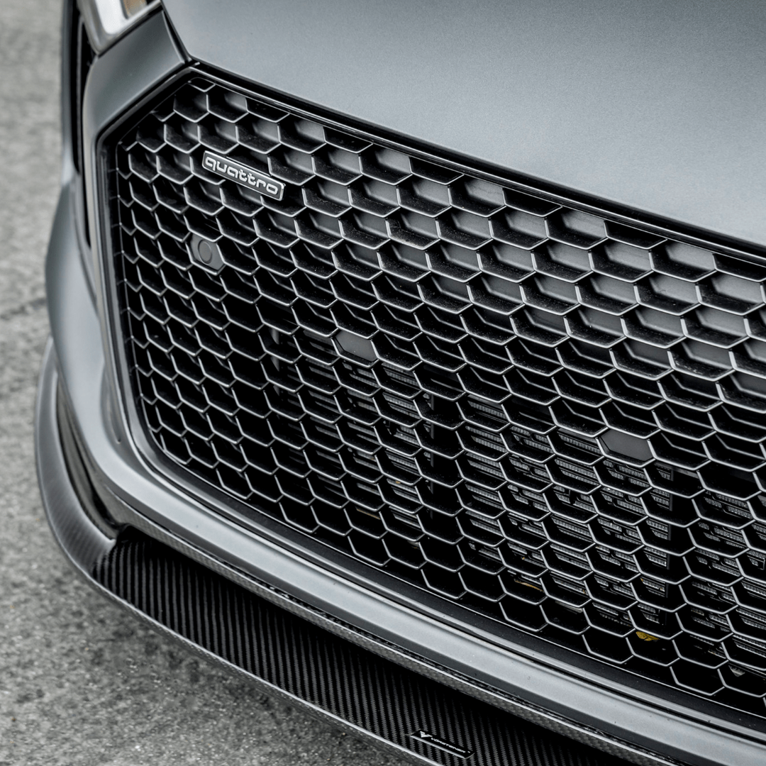 2017+ Audi R8 Vorsteiner carbon fiber aero front spoiler, lightweight aerodynamic upgrade with a sleek, high-performance design.