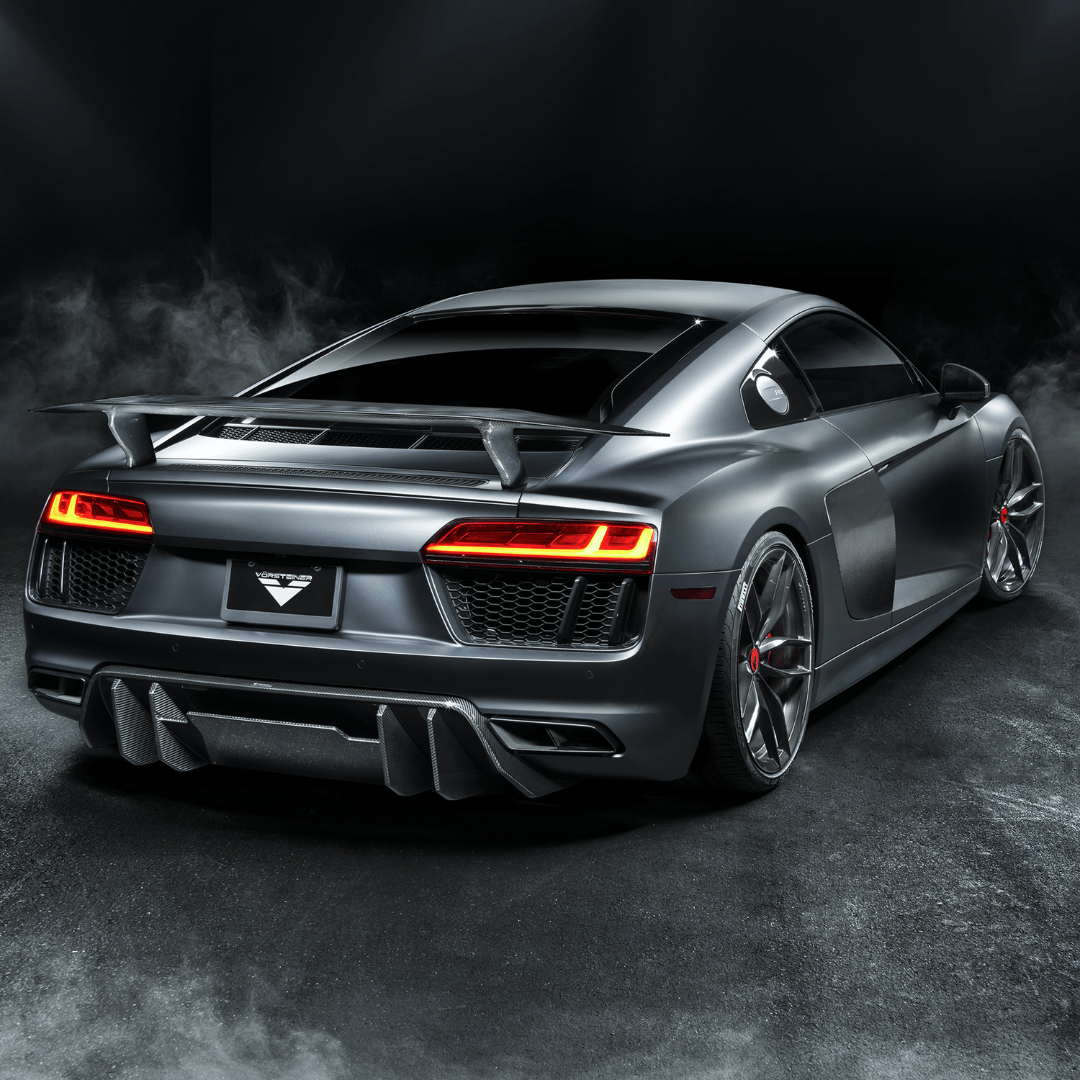 2017+ Audi R8 Vorsteiner Aero carbon fiber rear diffuser showing sleek aerodynamic design and intricate carbon fiber weave.