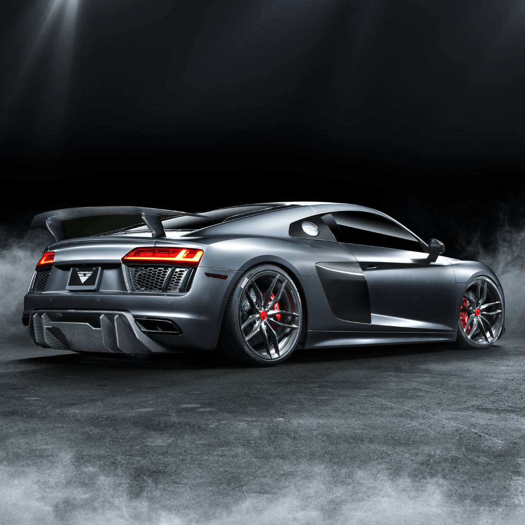 Audi R8 V10 Plus carbon fiber rear wing by Vorsteiner Aerodynamics, showcasing sleek aero design and high-performance rear spoiler.