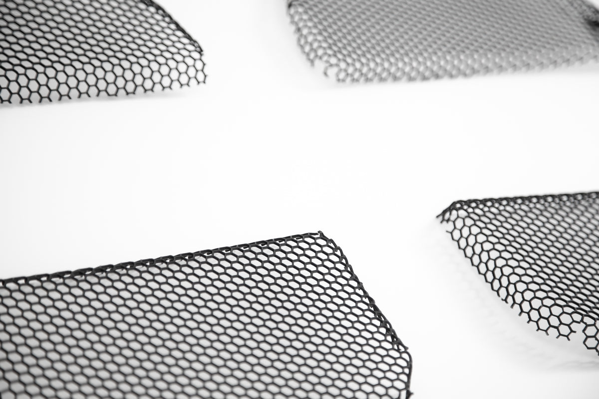 Vorsteiner Aero front grille mesh for BMW G8X M3 and M4, high-performance aerodynamic design, shown in black finish.