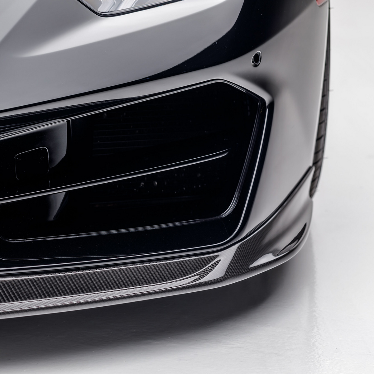 Vorsteiner Lamborghini Huracan LP580 Monza Aero front spoiler in carbon fiber, designed for aerodynamic performance and sleek style.