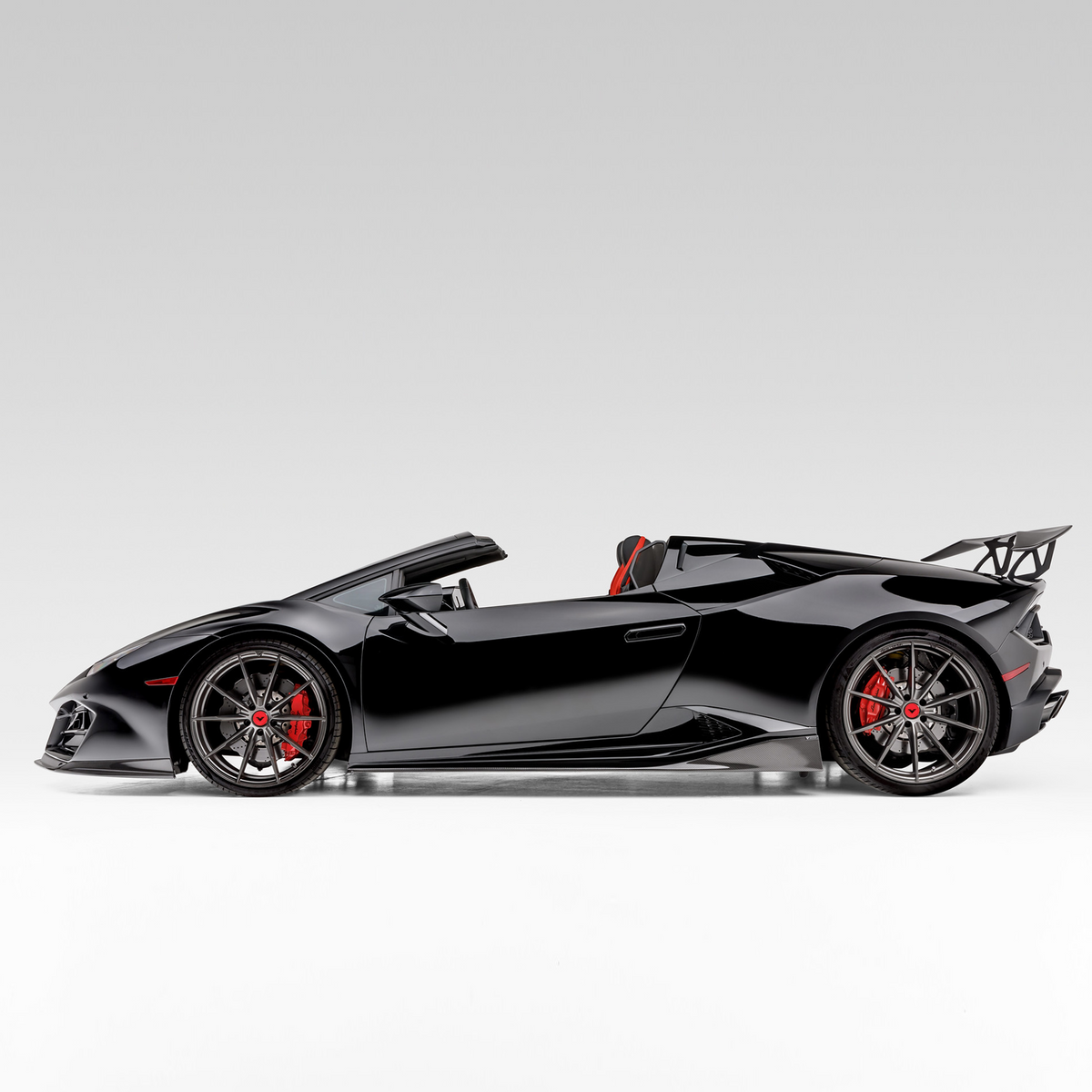 Vorsteiner Lamborghini Huracan LP580 Monza Aero front spoiler in carbon fiber, designed for aerodynamic performance and sleek style.